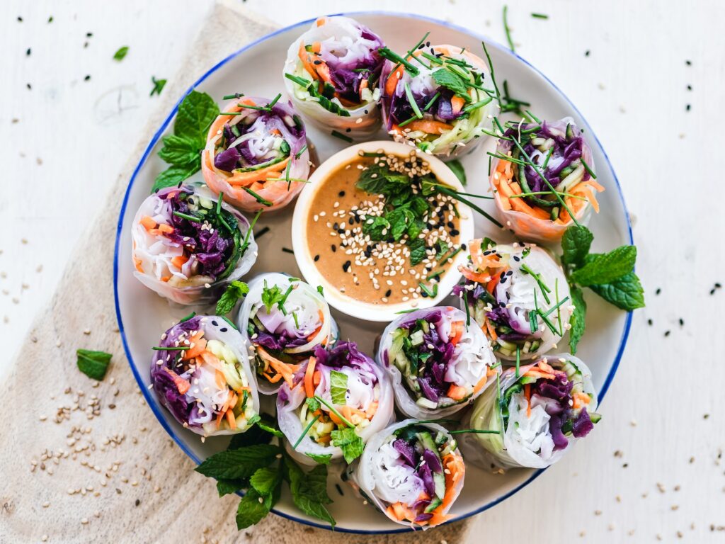 A plate of Vegetable Wraps with Dip
